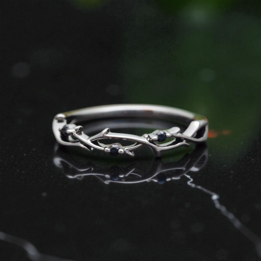 Aurora Infinity Moissanite Twist Ring