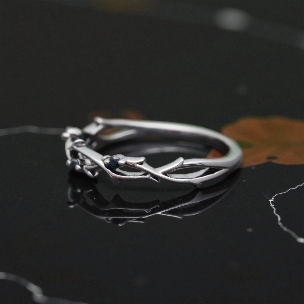 Aurora Infinity Moissanite Twist Ring