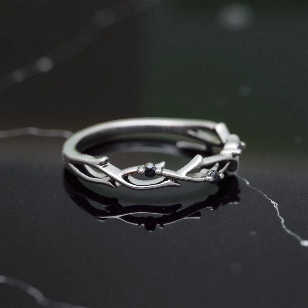 Aurora Infinity Moissanite Twist Ring